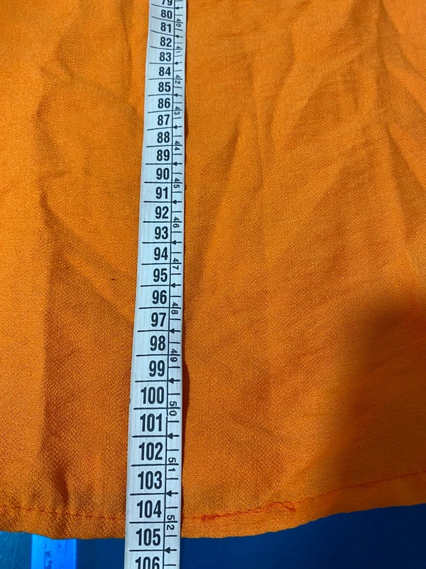 Coordinated top with peplum and palazzo trousers