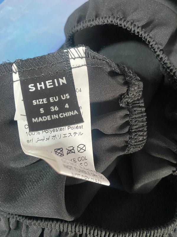 Top con Paillettes e Gonna Midi Silver