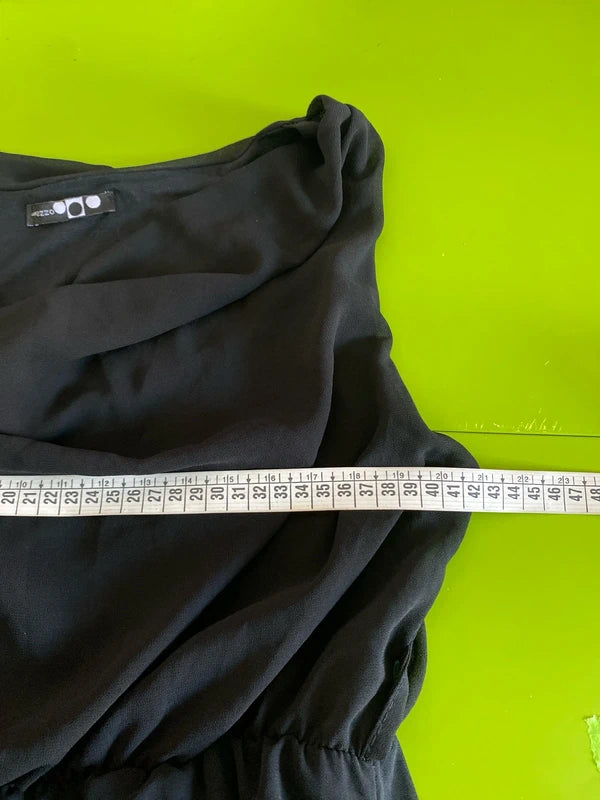 Dress with low neckline and draped skirt