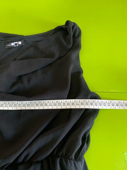 Dress with low neckline and draped skirt