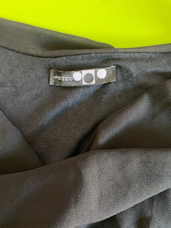 Dress with low neckline and draped skirt