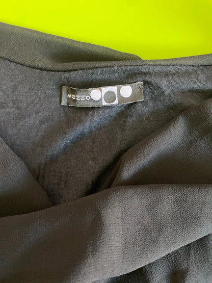 Dress with low neckline and draped skirt