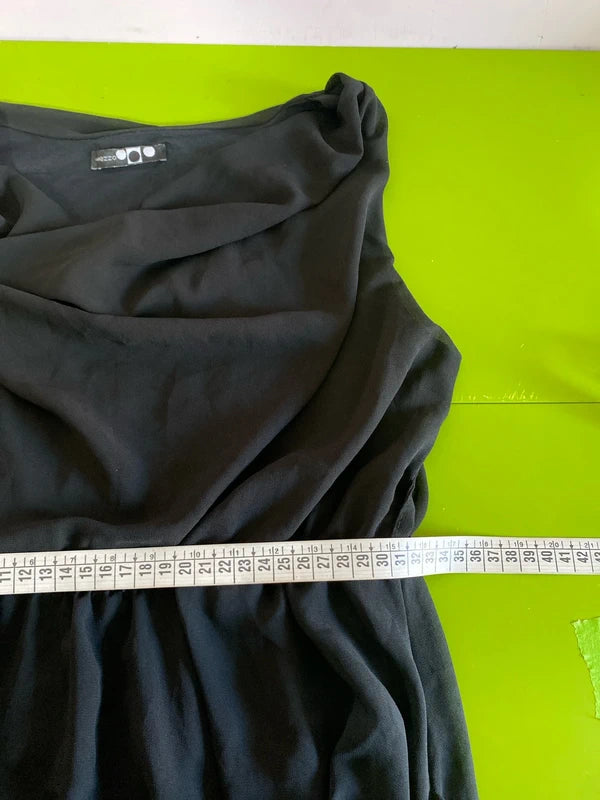 Dress with low neckline and draped skirt