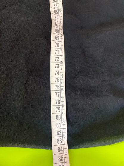 Dress with low neckline and draped skirt