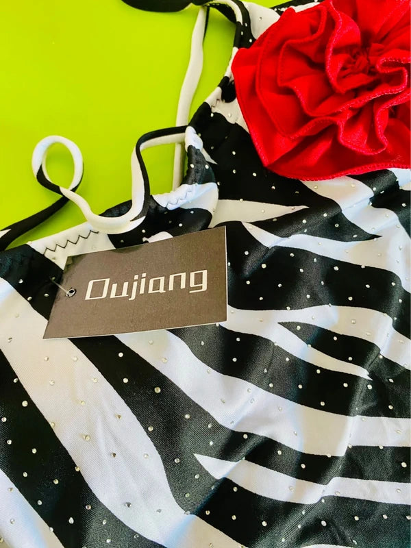 One-piece swimsuit and red skirt