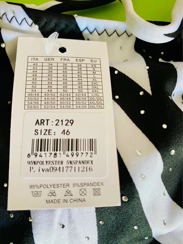 One-piece swimsuit and red skirt