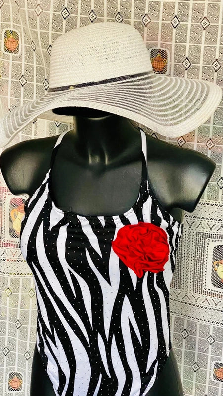 One-piece swimsuit and red skirt