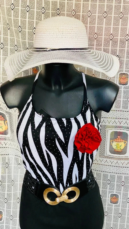 One-piece swimsuit and red skirt