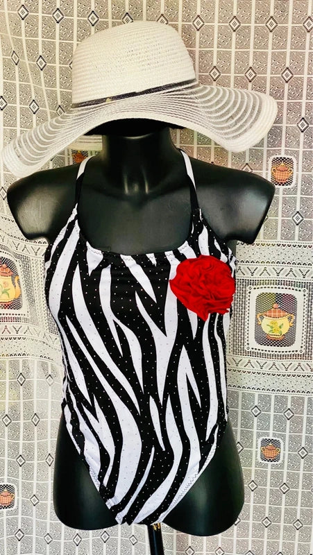 One-piece swimsuit and red skirt