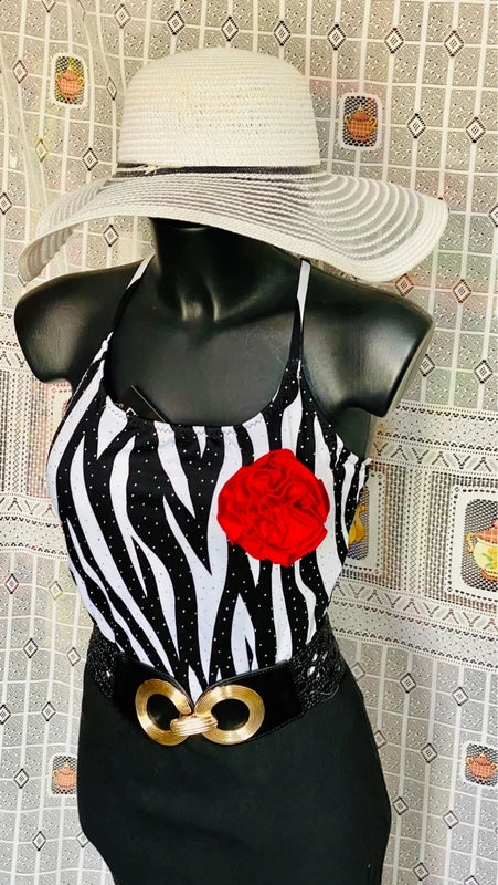 One-piece swimsuit and red skirt