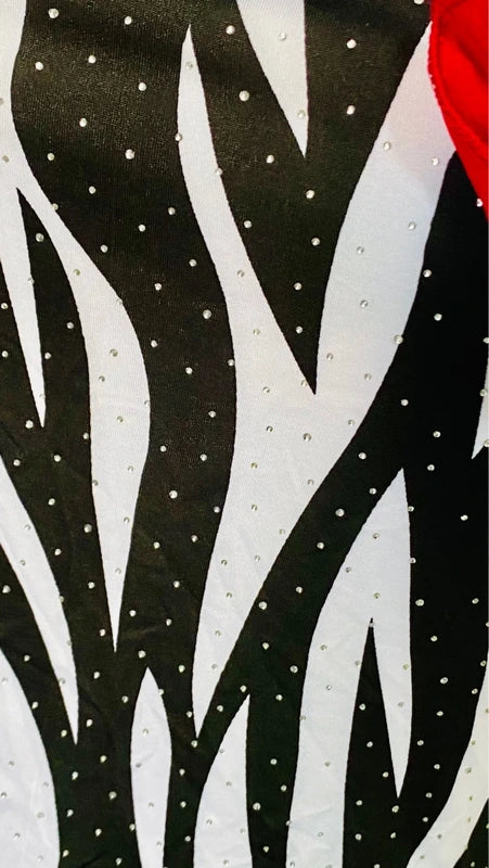 One-piece swimsuit and red skirt