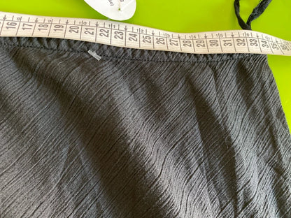 One-piece swimsuit and red skirt