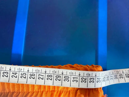 Coordinated top with peplum and palazzo trousers