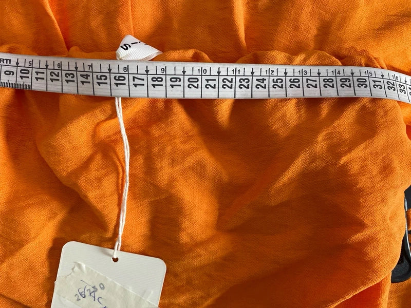 Coordinated top with peplum and palazzo trousers