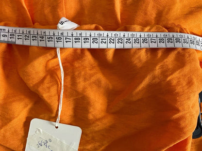 Coordinated top with peplum and palazzo trousers