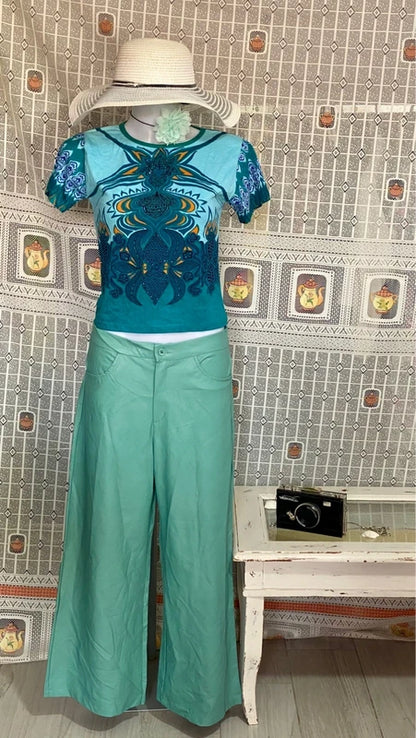 Completo pantalone a palazzo di pelle e top