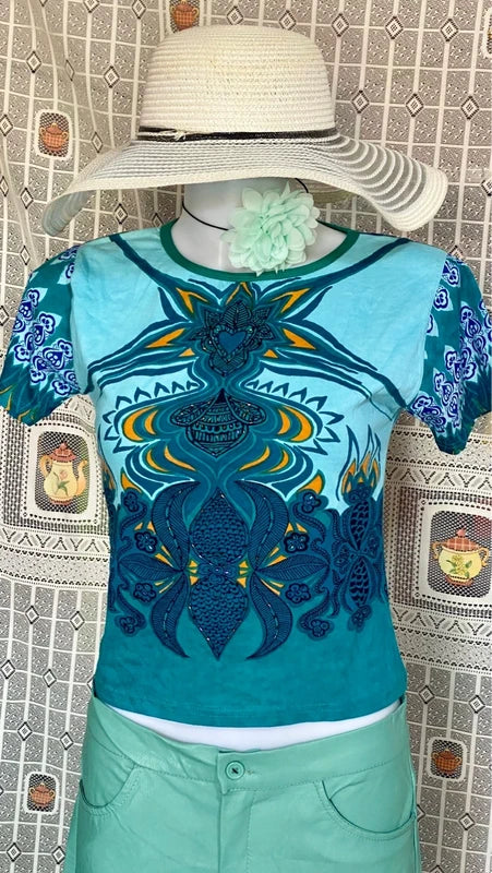 Completo pantalone a palazzo di pelle e top