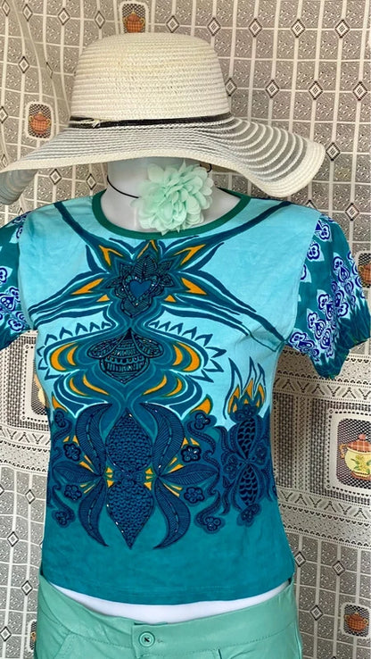 Completo pantalone a palazzo di pelle e top