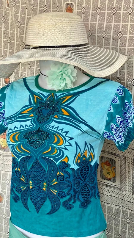 Completo pantalone a palazzo di pelle e top