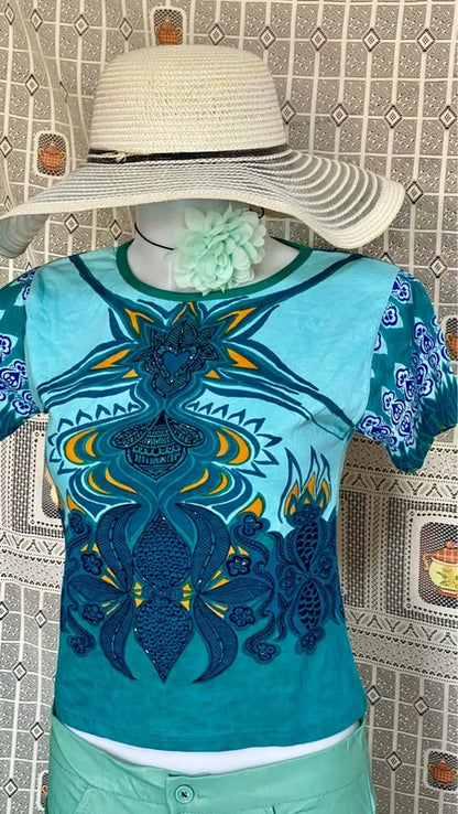 Completo pantalone a palazzo di pelle e top