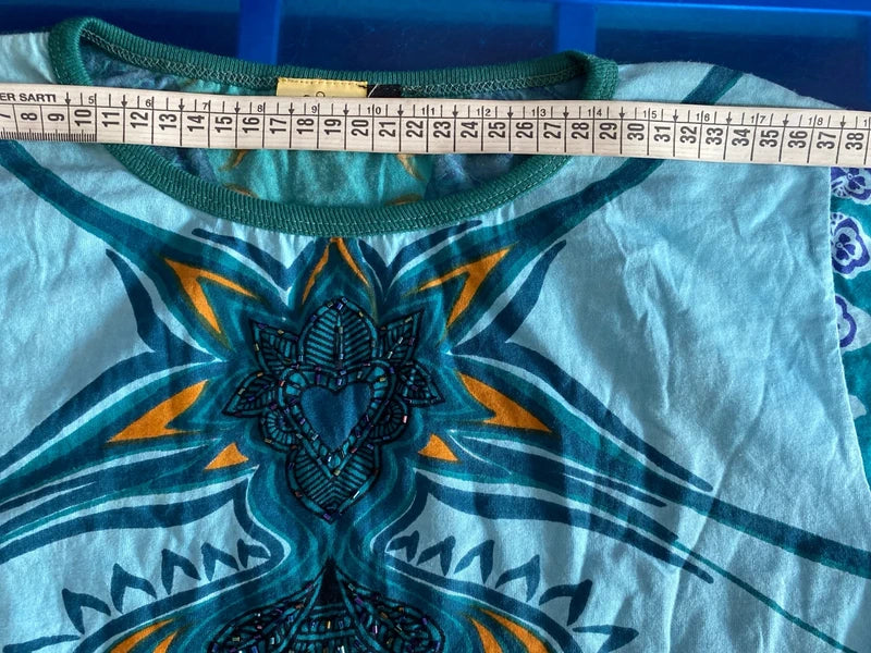 Completo pantalone a palazzo di pelle e top