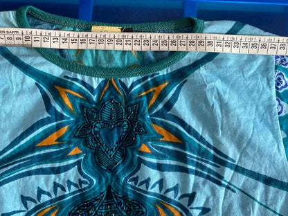 Completo pantalone a palazzo di pelle e top