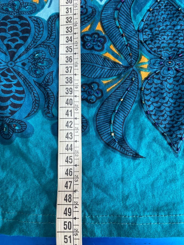 Completo pantalone a palazzo di pelle e top