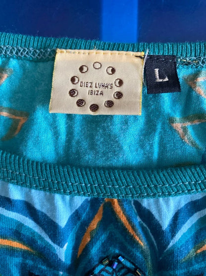 Completo pantalone a palazzo di pelle e top