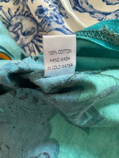 Completo pantalone a palazzo di pelle e top