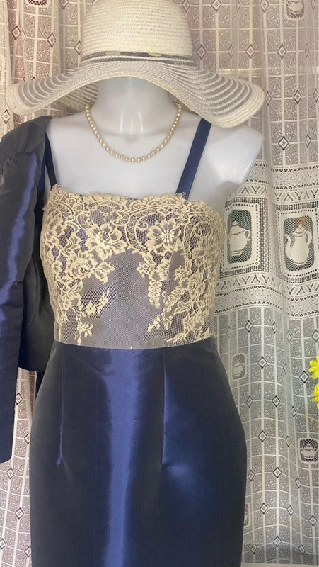 Elegant dress with lace bolero