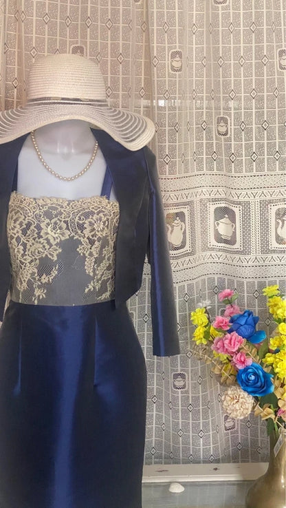 Elegant dress with lace bolero