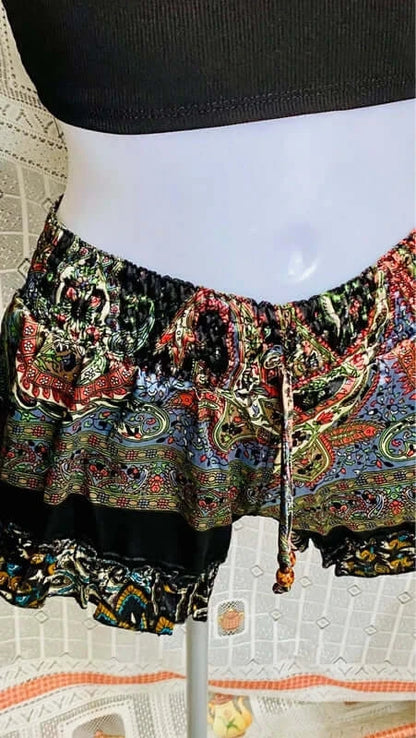 Colorful Boho chic outfit shorts with elastic waist and drawstring, perfect for a casual summer look.