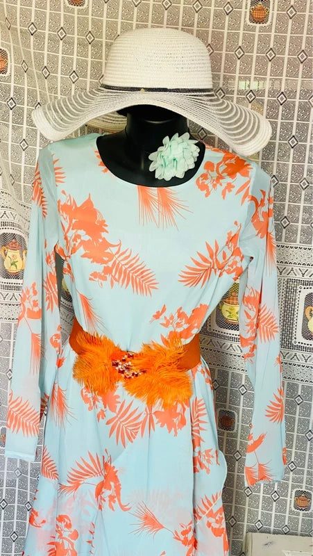 Long dress with asymmetric voiles