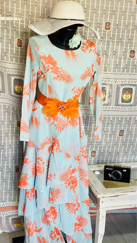 Long dress with asymmetric voiles