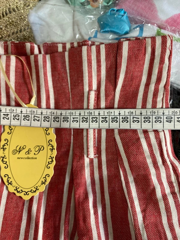 High-waisted palazzo trousers and voile top set