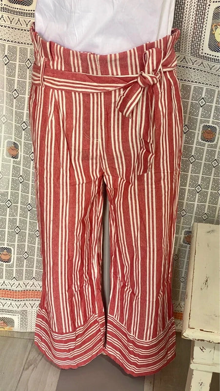 High-waisted palazzo trousers and voile top set