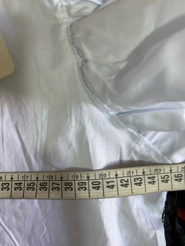 High-waisted palazzo trousers and voile top set