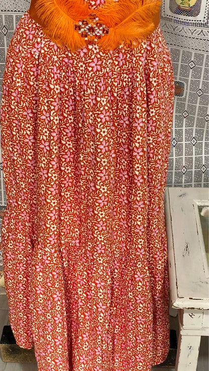 Abito lungo con voilant e frange