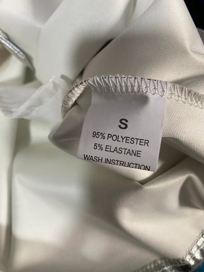 Top con Paillettes e Gonna Midi Silver