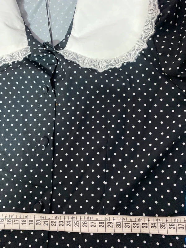 Abito a pois con collo ampio in pizzo misure In Foto