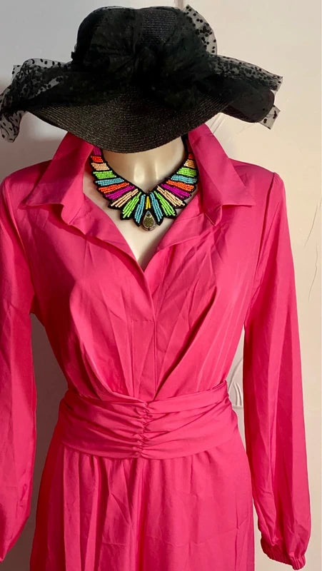 Bellissima Tuta Elegante Con Fusciacca a Cintura misure nelle foto