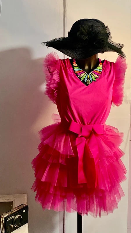Abito in tulle fucsia con fiocco in vita dalla S alla 46