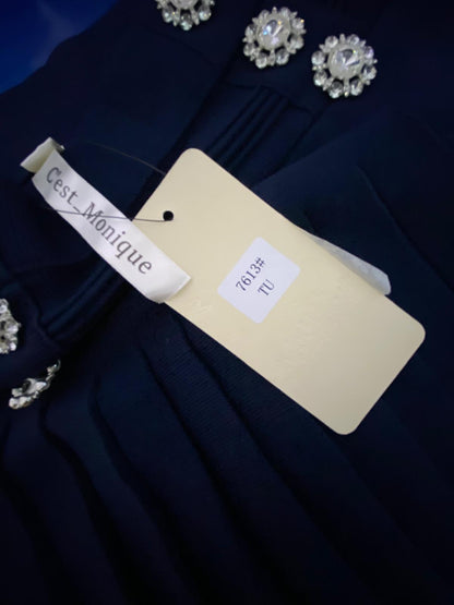 Completo con Gonna a Vita Alta & Top Misure nelle Foto