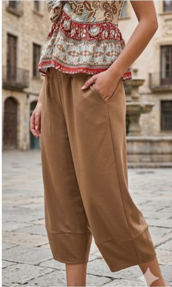 Pantaloni palazzo a gamba larga stile boho chic con tasche anteriori