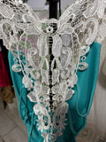 Top drappeggiato elastico con scollo sul retro in pizzo