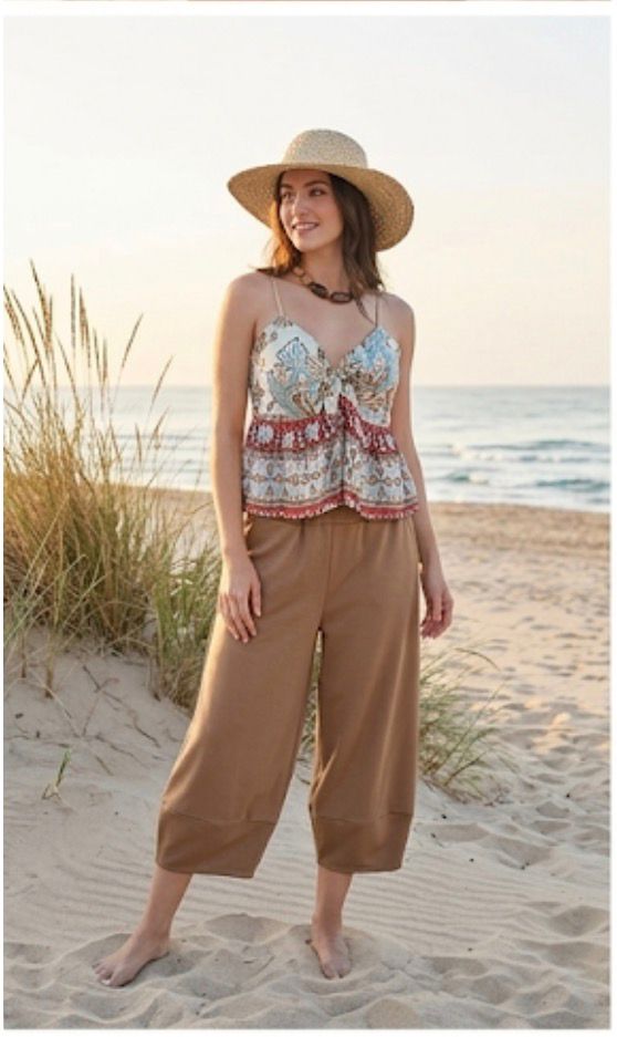 Pantaloni palazzo a gamba larga stile boho chic con tasche anteriori