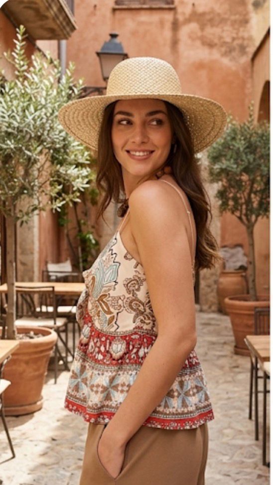 Pantaloni palazzo a gamba larga stile boho chic con tasche anteriori